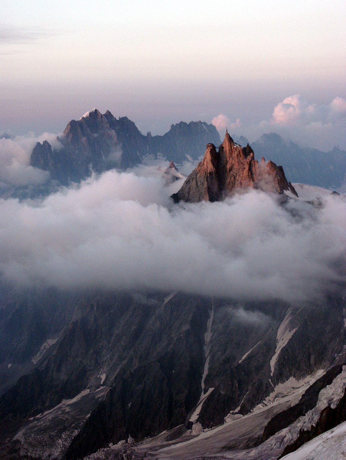 Aiguille du Midi (France, Chamonix) in summer after sundown, seen from the Mont Blanc refuge