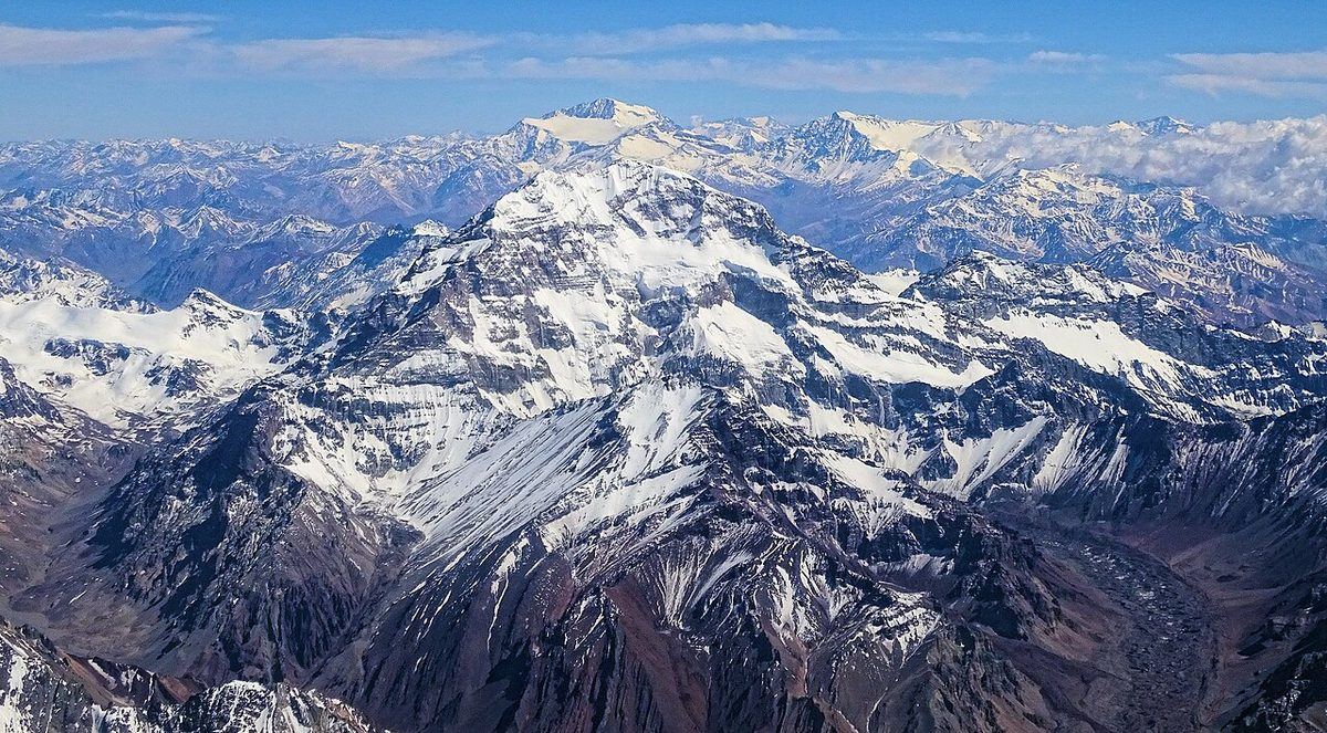 Aconcagua seen from a commercial flight between Buenos Aires, Argentina, and Santiago de Chile in December 2016. In the background we also see the mountain Mercedario.