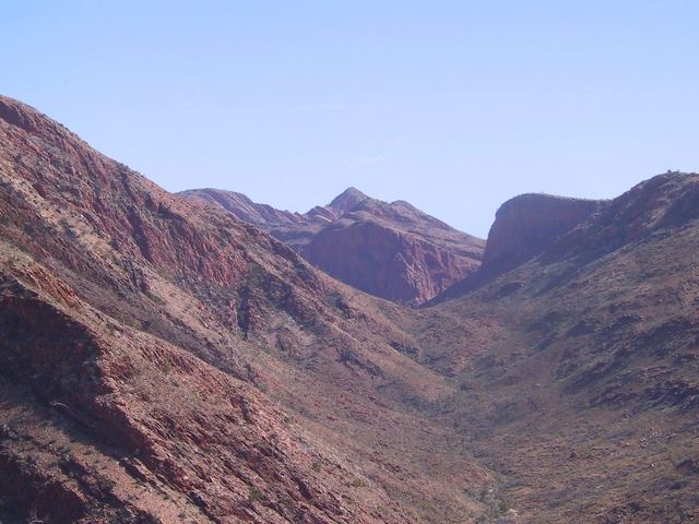 Along the Larapinta trail from a ridge of the West MacDonnell Ranges. This image was taken in mid-2004 about 100 kilometres west of Alice Springs.