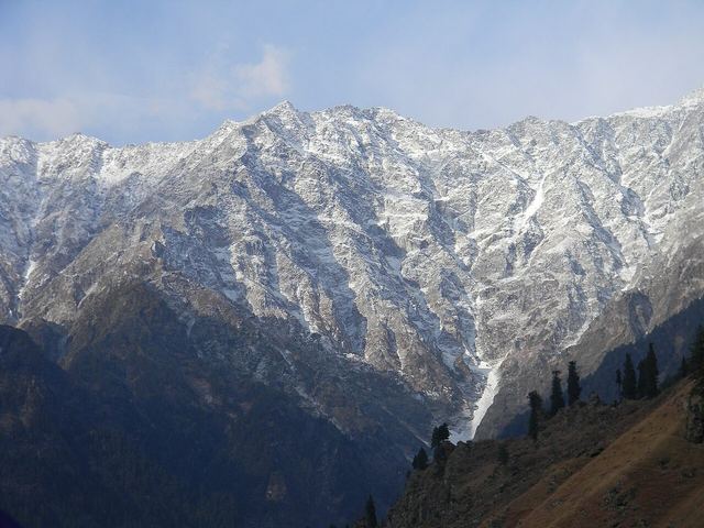The image show the snow covered mountain of middle Himalayas during the month of October