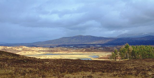 The sun breaks partially through the clouds in a rainy day on the outskirt of Rannoch Moor in late April 2008 on West Highland Way on the way from Bridge of Orchy to Kingshouse
